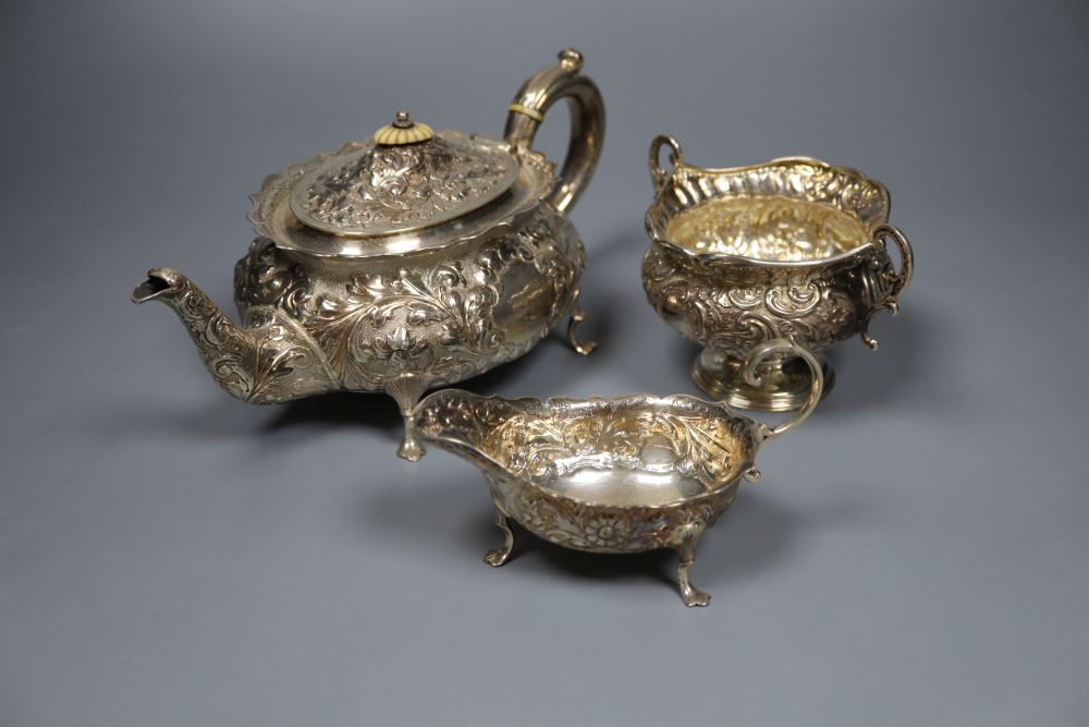 A matched late Victorian 3-piece silver tea set, London, 1897(2) and Birmingham, 1893, gross 20.5oz.